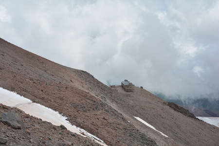 Base camp of mountaineers in the mountains of the Caucasus at the base of Mount Kazbek (Weather Station)の写真素材