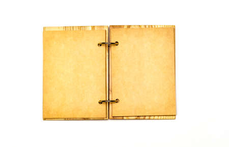 an open scrapbook notebook with a cover made of natural materialsの写真素材