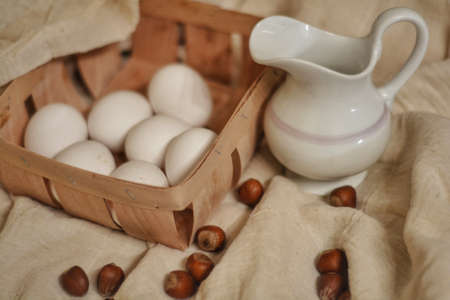 still life with a jug and chicken eggsの写真素材