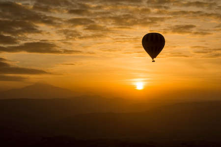 romantic journey hot air balloon early in the morningの写真素材