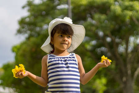Cute smiling brunette girl performing model posesの写真素材