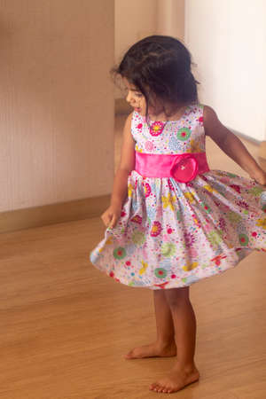 Little girl with cute look and smilingの写真素材