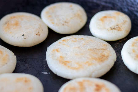 The arepa is the main traditional food of Venezuela and Colombia.の写真素材