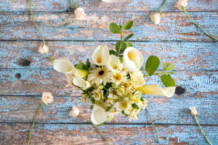 Floral arrangement of callas lilly and gerberasの写真素材