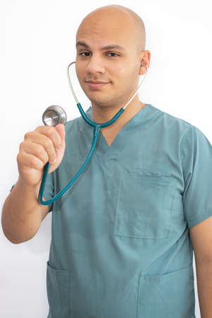 Bald doctor with medical scrubsの写真素材