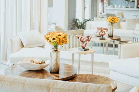 Floral arrangement  of sunflowers decorating the living room of the houseの写真素材