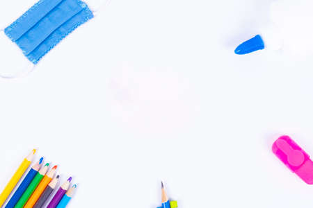 Back to school background with supplies and face mask, copy space.の写真素材