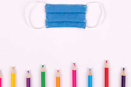 Back to school background with supplies and face mask, copy space.の写真素材