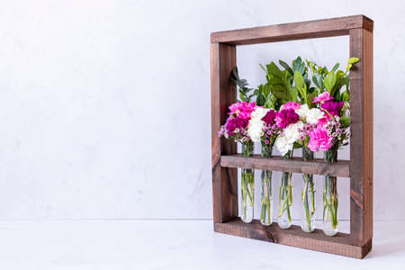 Floral arrangement in wooden boxの写真素材