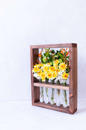 Floral arrangement in wooden boxの写真素材