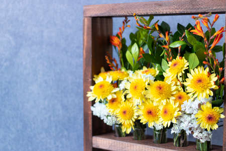 Floral arrangement in wooden boxの写真素材