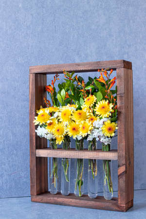 Floral arrangement in wooden boxの写真素材