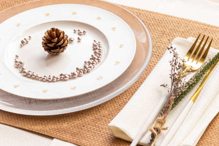 Elegant table set for Christmas dinnerの写真素材