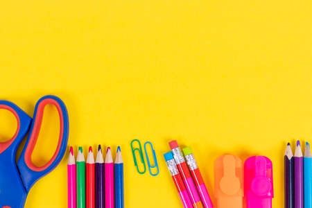 Back to school background with supplies and paper leaves, copy-space.の写真素材