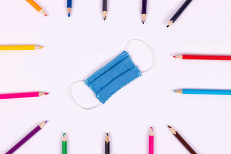 Back to school background with supplies and face mask, copy space.の写真素材
