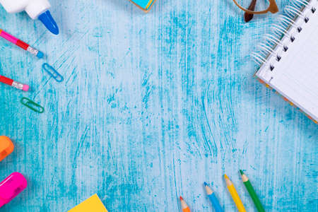 Back to school background with supplies and paper leaves, copy-space.の写真素材