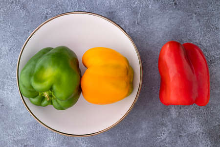 Aerial view of red, green and yellow peppersの写真素材