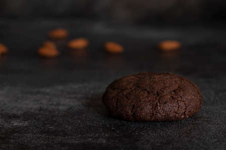 Still life with chocolate cookie on dark backgroundの写真素材