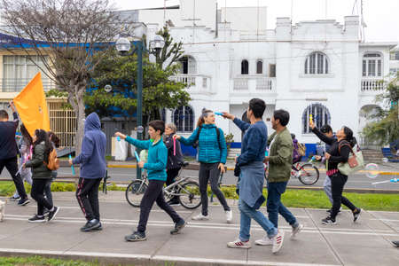 LIMA, PERU - SEP 08TH 2019: March of the members of the FIQUI Association of Peru in the District of Miraflores in September 2019 in Peru.のeditorial素材