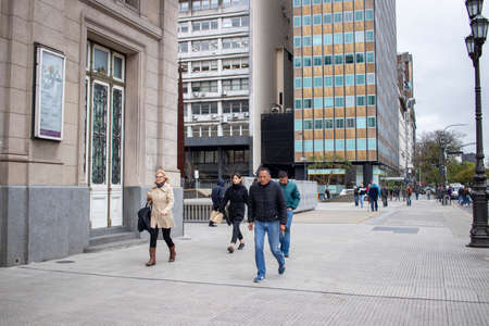 BUENOS AIRES - 15TH OCT 2019: People walking through the streets of the city of Buenos Aires in Argentina.のeditorial素材