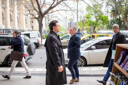 BUENOS AIRES - 15TH OCT 2019: People walking through the streets of the city of Buenos Aires in Argentina.のeditorial素材