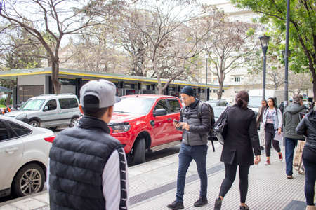BUENOS AIRES - 15TH OCT 2019: People walking through the streets of the city of Buenos Aires in Argentina.のeditorial素材