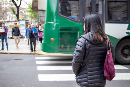 BUENOS AIRES - 15TH OCT 2019: People walking through the streets of the city of Buenos Aires in Argentina.のeditorial素材