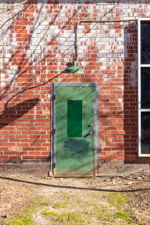 Entrance door with lampの写真素材