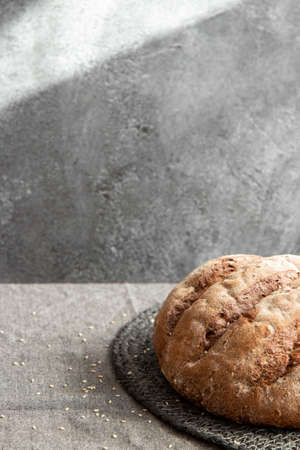 Bread in basket on gray marbled backgroundの写真素材