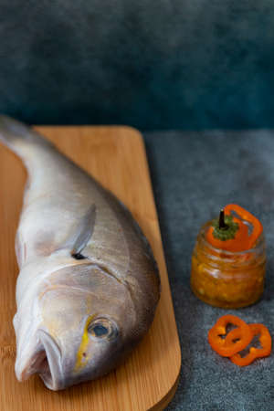 Still life with fresh fish and Peruvian ingredients for cookingの写真素材
