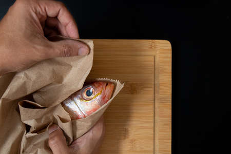 Still life with fresh fish and Peruvian ingredients for cooking