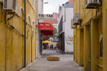 Willemstad, Curacao - Nov 06th 2014: View of people in the colorful alleys of Willemstad in Curacaoのeditorial素材