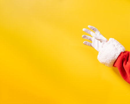 Santa hands trying to catch something in the airの写真素材