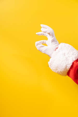 Santa hands trying to catch something in the airの写真素材