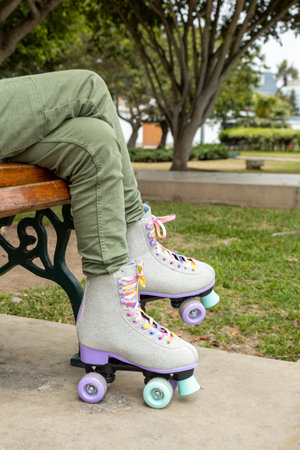 View of legs with skates on, ready to roller skateの写真素材