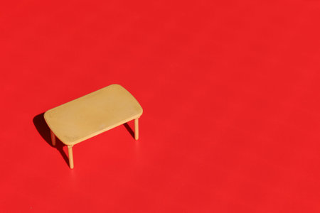 Eating table on red background. Conceptualの写真素材