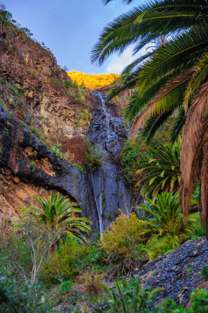 Waterfall near Masca village with mountains, Tenerife, Canarian Islandsの写真素材