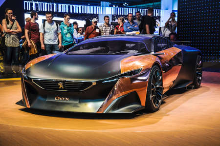 FRANKFURT - SEPT 21: Peugeot Onyx hybrid supercar (conceptcar) presented as world premiere at the 65th IAA (Internationale Automobil Ausstellung) on September 21, 2013 in Frankfurt, Germanyのeditorial素材
