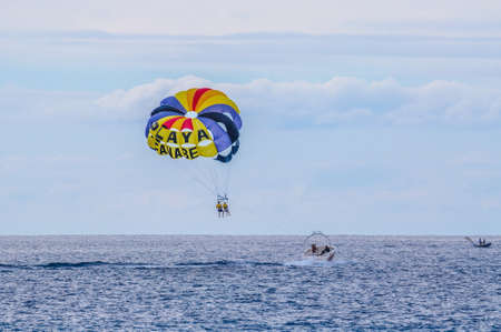 TENERIFE, SPAIN - DEC 2012: parasailing in the sky on December 6, 2012 in Tenerife, Spain.のeditorial素材
