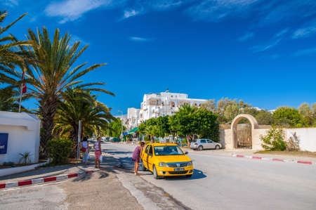 HAMMAMET, TUNISIA - Oct 2014: Yellow taxi on the street on October 6, 2014 in Hammamet, Tunisiaのeditorial素材
