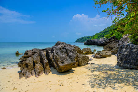 Koh Phaluai, Mu Ko Ang Thong National Park, Gulf of Thailand, Siam, Rocks, sea and blue skyの写真素材