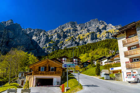 Chalet and hotels in swiss village in Alps, Leukerbad, Leuk, Visp, Wallis, Valais Switzerlandの写真素材
