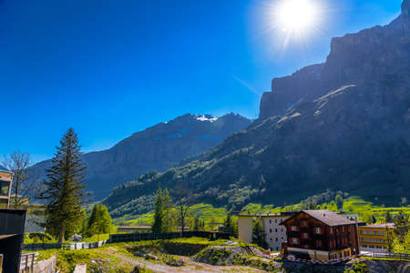 Sun rays in Swiss Village in Alp mountains, Leukerbad, Leuk, Visp, Wallis, Valais Switzerland