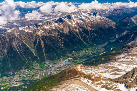 Valley with villages between snowy mountains Chamonix, Mont Blanc, Haute-Savoie, Alps, France.