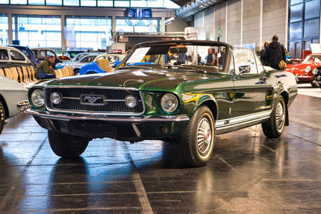 FRIEDRICHSHAFEN - MAY 2019: emerald dark green FORD MUSTANG T5 GT RALLY 1966 cabrio at Motorworld...