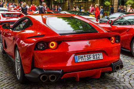 GERMANY, FULDA - JUL 2019: red FERRARI 812 SUPERFAST Type F152M is a front mid-engine, rear-wheel-drive grand tourer produced by Italian sports car manufacturer Ferrari that made its debut at the 2017 Geneva Motor Show. The 812 Superfast is the successor のeditorial素材