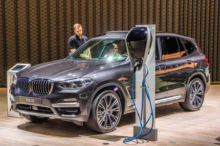 FRANKFURT, GERMANY - SEPT 2019: gray BMW X3 G01 hybrid electric SUV car, IAA International Motor...