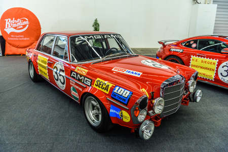 FRANKFURT, GERMANY - SEPT 2019: red MERCEDES-BENZ AMG 300 SEL W109 race sport sedan 1971, IAA...