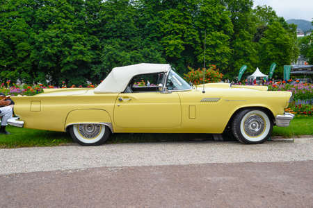 BADEN BADEN, GERMANY - JULY 2019: light yellow white FORD THUNDERBIRD first generation cabrio...