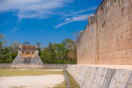 Stone wall with a ring of Grand Ball Court, Gran Juego de Pelota of Chichen Itza archaeological site in Yucatan, Mexico.の写真素材